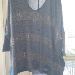 JLO oversize sweater.